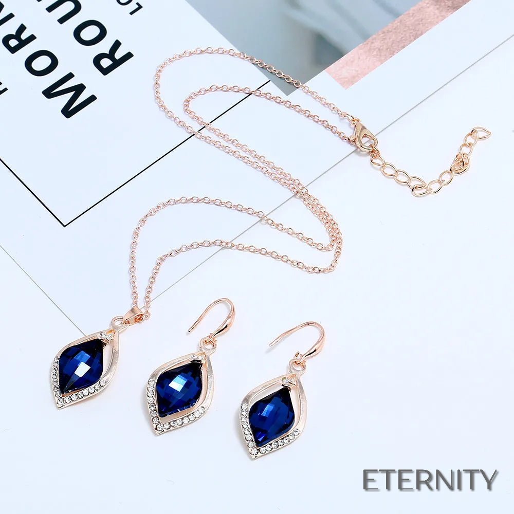 Set de Collar y Pendientes con Diseño Geométrico y Cristal Azul - ETERNITY