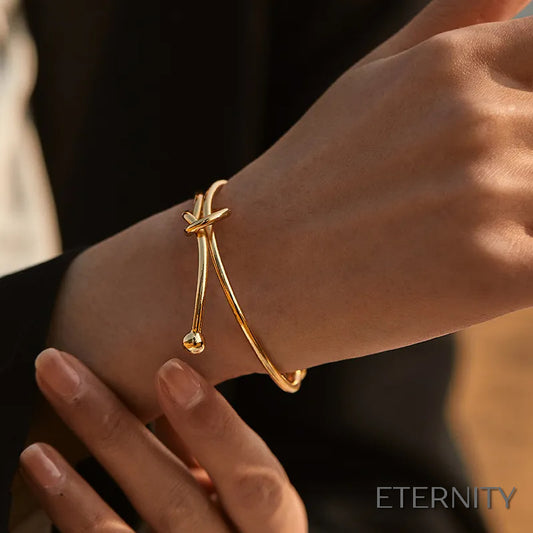 Pulsera Abierto Dorado con Diseño de Nudo Trenzado Creativo - ETERNITY