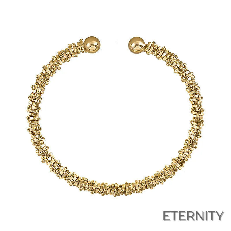 Brazalete Abierto Dorado con Diseño Irregular Trenzado Estilo Vintage - ETERNITY