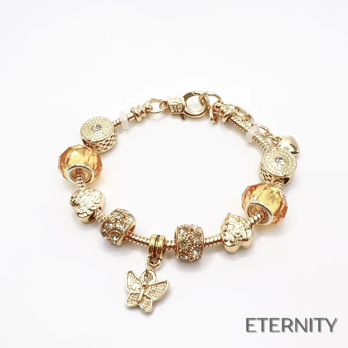 Pulsera Ajustable Dorada con Cuentas de Corazón, Caladas y Brillantes - ETERNITY