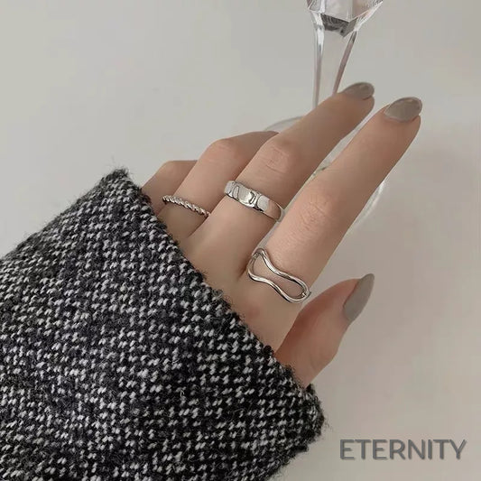 Set de dos Anillos con Forma Ondulada y Trenzada - ETERNITY