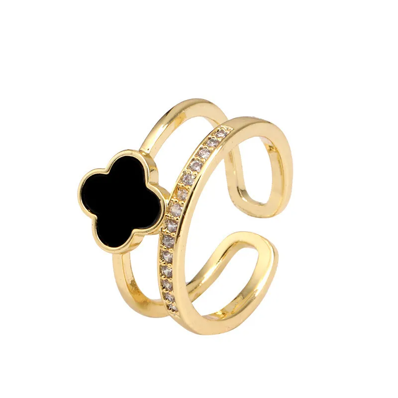Anillos Femeninos Modernos con Trébol Esmaltado Blanco y Negro y Circonitas - ETERNITY